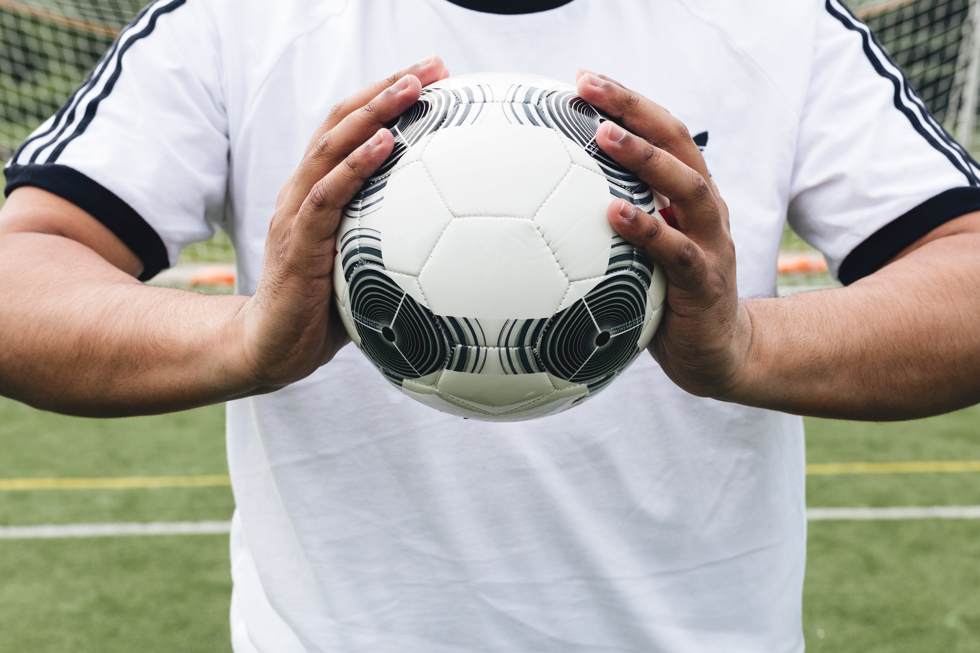 files/soccer-ball-in-athletes-hands.jpg